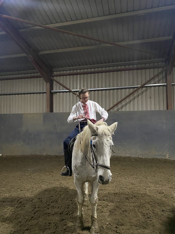 Ihor Melashchenko riding a white horse