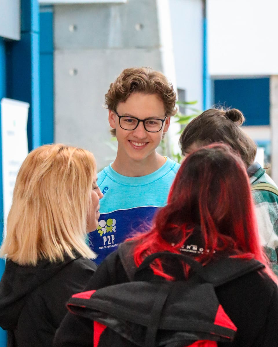 Ihor Melashchenko speaking with students while volunteering with SETU Peer to Peer Support